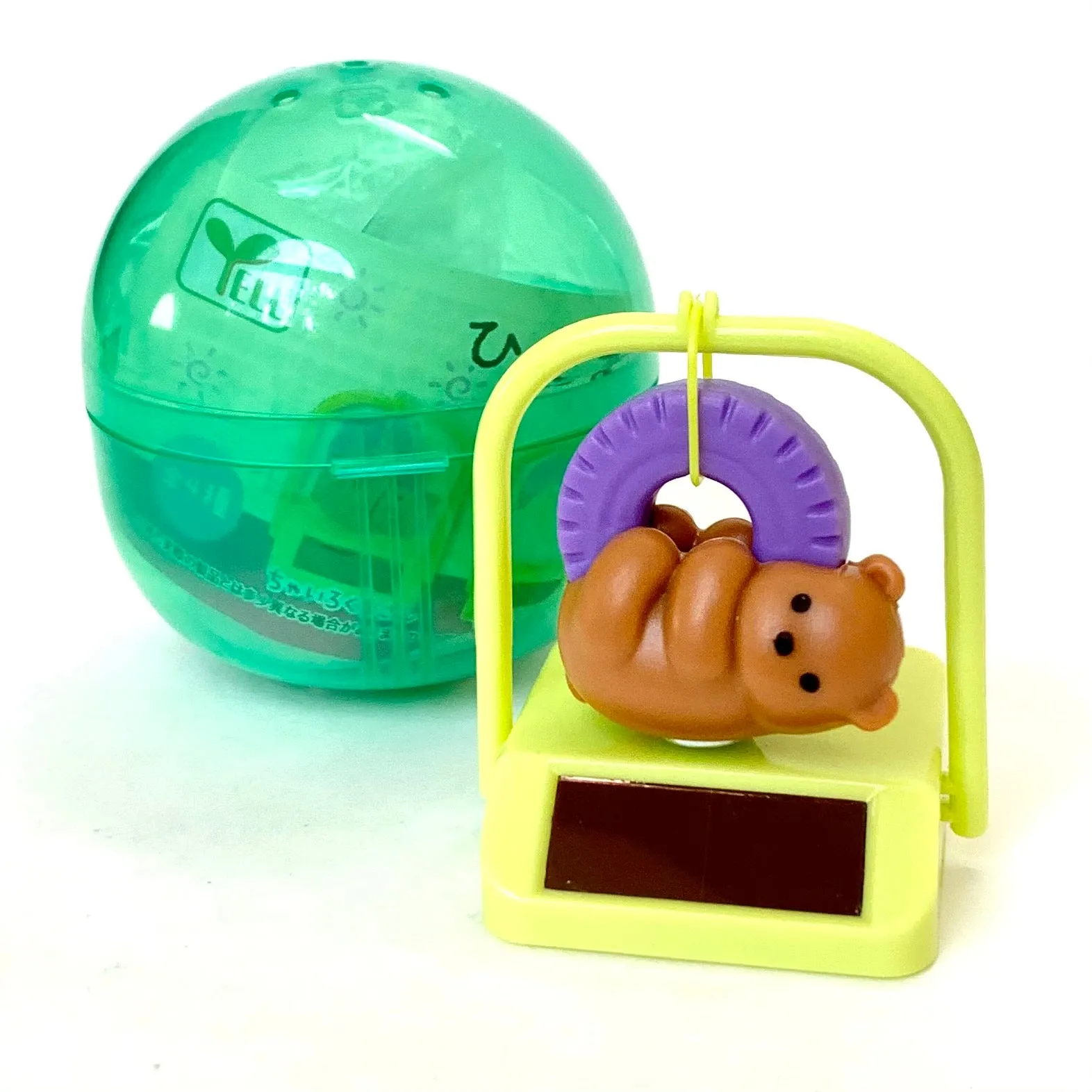 X 70834 SOLAR SWINGING BEAR  CAPSULE-DISCONTINUED