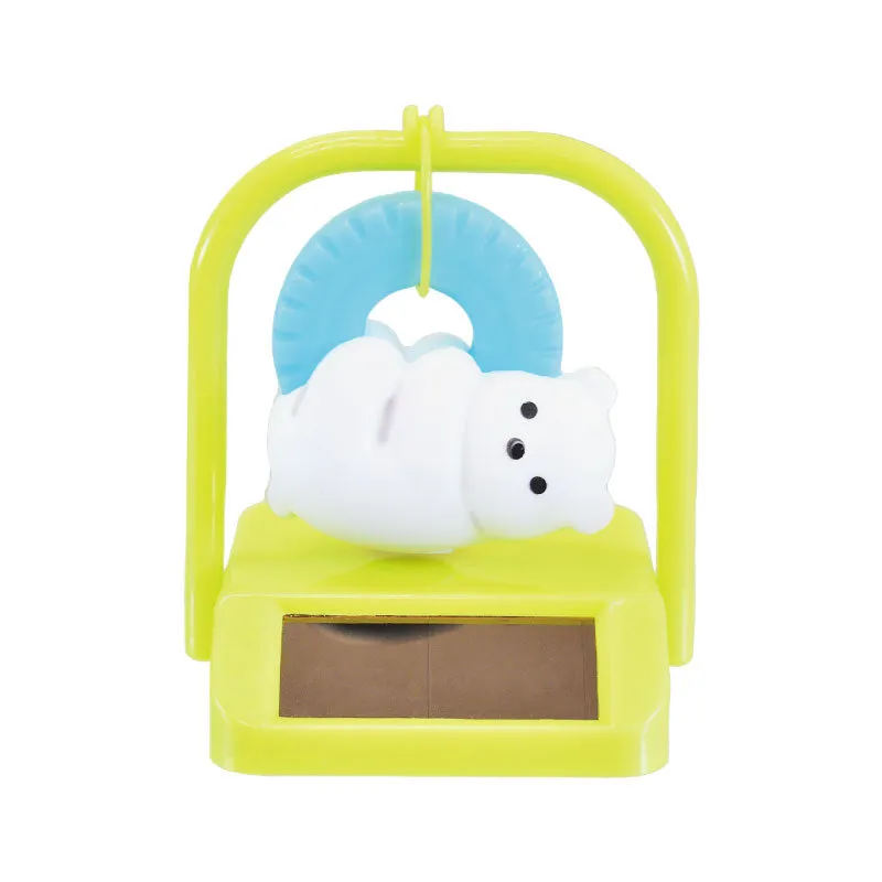 X 70834 SOLAR SWINGING BEAR  CAPSULE-DISCONTINUED