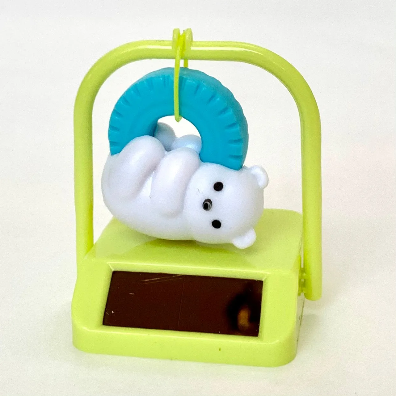 X 70834 SOLAR SWINGING BEAR  CAPSULE-DISCONTINUED