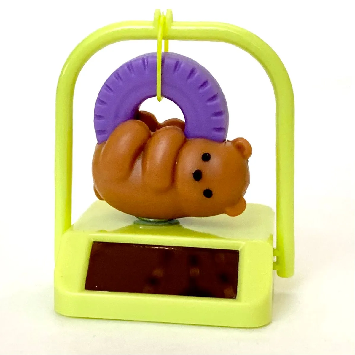 X 70834 SOLAR SWINGING BEAR  CAPSULE-DISCONTINUED