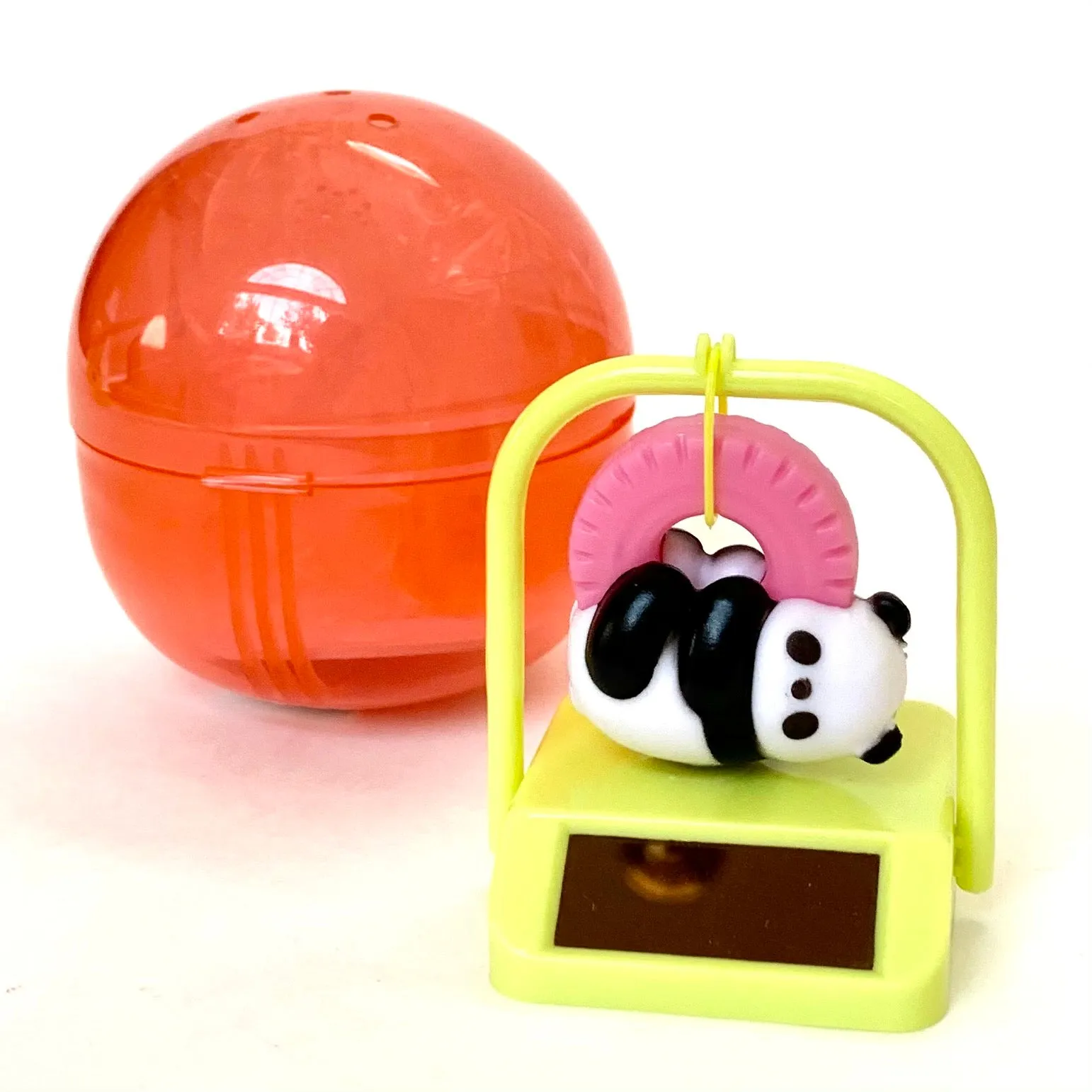 X 70834 SOLAR SWINGING BEAR  CAPSULE-DISCONTINUED