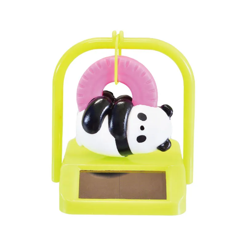 X 70834 SOLAR SWINGING BEAR  CAPSULE-DISCONTINUED